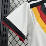 conjunto-niño-alemania-primera-equipacion-2025-2026-puño