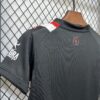 conjunto-niño-sporting-de-gijon-segunda-equipacion-2025-2026-cuello-trasero