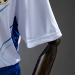 conjunto-niño-tenerife-primera-equipacion-2025-2026-puño