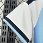camiseta-argentina-primera-equipacion-mujer-mundial-2026-puño