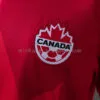 camiseta-canada-primera-equipacion-mundial-2026-escudo