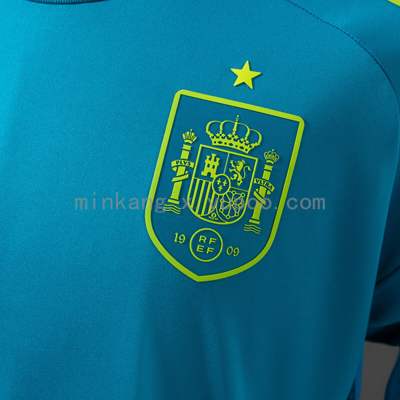 camiseta-españa-portero-azul-mundial-2026-escudo