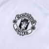 chandal-manchester-united-cremallera-alta-2025-2026-escudo