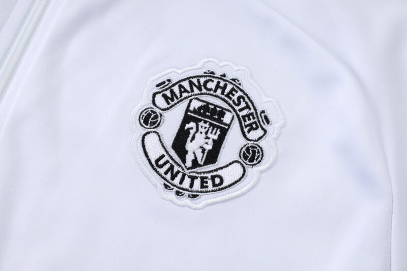 chandal-manchester-united-cremallera-alta-2025-2026-escudo