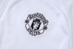 chandal-manchester-united-cremallera-alta-2025-2026-escudo