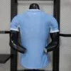 camiseta-manchester-city-primera-equipacion-version-jugador-2026-2027-parte-trasera