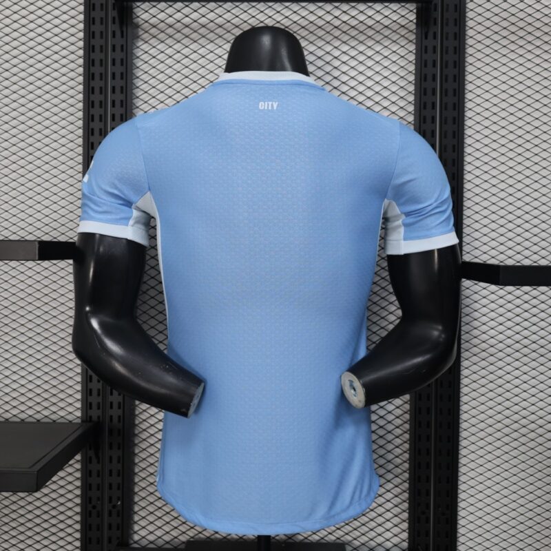 camiseta-manchester-city-primera-equipacion-version-jugador-2026-2027-parte-trasera
