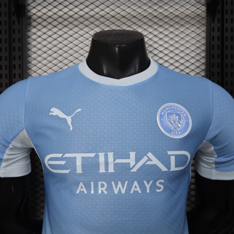 camiseta-manchester-city-primera-equipacion-version-jugador-2026-2027-pecho