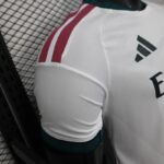 camiseta-real-madrid-primera-equipacion-version-jugador-2026-2027-puño-2