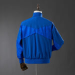 cortaviento-chelsea-azul-2025-2026-parte-trasera