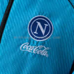 cortaviento-napoli-sky-blue-2025-2026-escudo