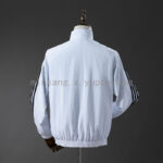 cortaviento-real-madrid-reversible-2025-2026-parte-trasera