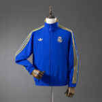 cortaviento-real-madrid-reversible-azul-y-amarillo-2025-2026-1