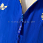 cortaviento-real-madrid-reversible-azul-y-amarillo-2025-2026-pecho