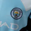 sudadera-manchester-city-manga-larga-2025-2026-escudo