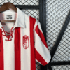 camiseta-granada-primera-equipacion-retro-2005-2006-puño