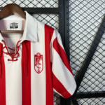 camiseta-granada-primera-equipacion-retro-2005-2006-puño