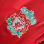 camiseta-liverpool-primera-equipacion-champions-league-retro-2008-2009-escudo