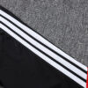 chandal-alemania-negro-rojo-cremallera-baja-2026-2027-hombro