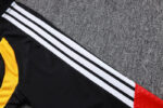 chandal-alemania-negro-rojo-cremallera-baja-2026-2027-hombro