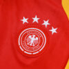 chandal-alemania-rojo-cremallera-baja-2025-2026-escudo