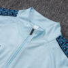 chandal-manchester-city-cremallera-baja-celeste-2025-2026-cuello