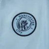 chandal-manchester-city-cremallera-baja-celeste-2025-2026-escudo
