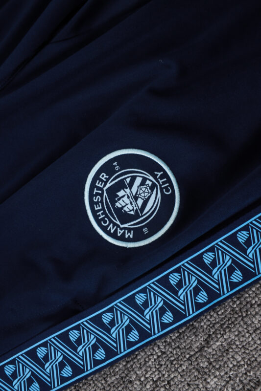 chandal-manchester-city-cremallera-baja-celeste-2025-2026-escudo-pantalon