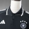 camiseta-alemania-polo-negro-2025-2026-pecho
