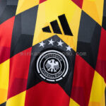 camiseta-alemania-pre-match-mundial-2026-escudo