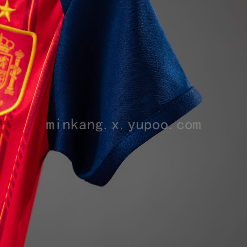 body-de-bebe-españa-primera-equipacion-mundial-2026-puño