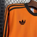 camiseta-holanda-primera-equipacion-manga-larga-retro-1980-hombro