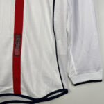 camiseta-inglaterra-primera-equipacion-manga-larga-retro-2002-puño