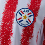 camiseta-paraguay-primera-equipacion-mundial-2026-escudo