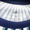 camiseta-argentina-calentamiento-mundial-2026-cuello