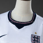 camiseta-inglaterra-primera-equipacion-mujer-mundial-2026-cuello