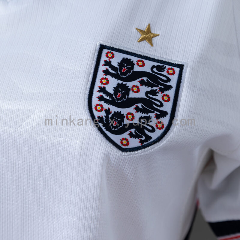 camiseta-inglaterra-primera-equipacion-mujer-mundial-2026-escudo