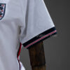 camiseta-inglaterra-primera-equipacion-mujer-mundial-2026-puño