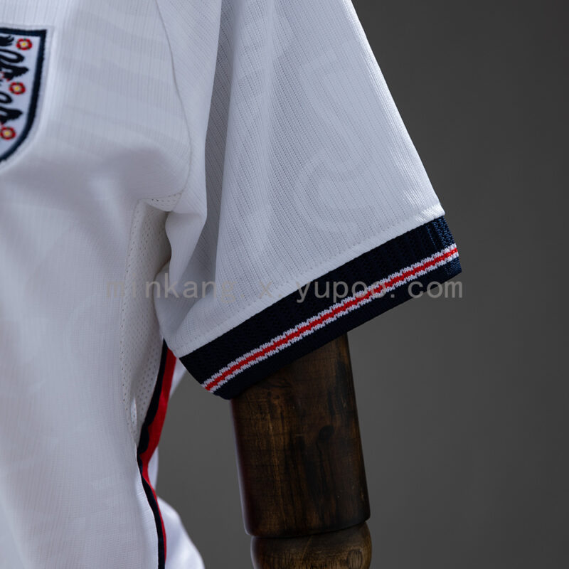 camiseta-inglaterra-primera-equipacion-mujer-mundial-2026-puño