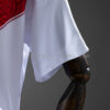 conjunto-niño-peru-primera-equipacion-mundial-2026-puño